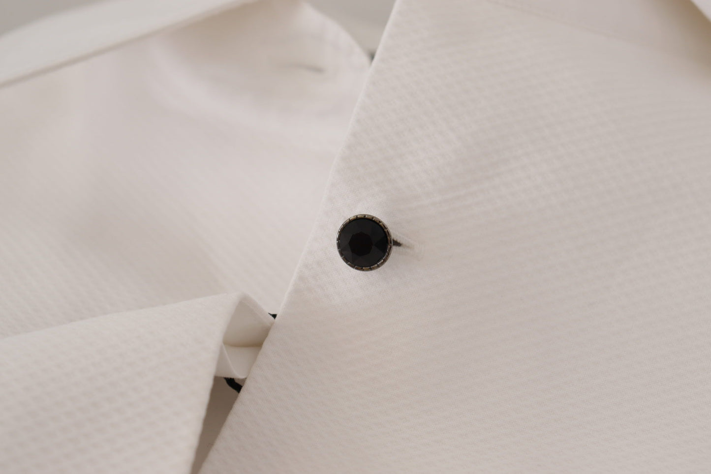 - Elegant Sleeveless Tuxedo Blouse with Crystal Buttons