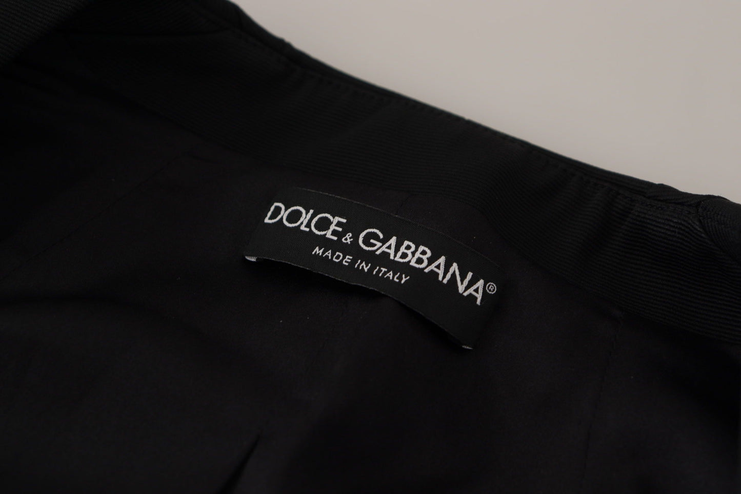 - Sleek Black Snap Jacket with Silk Lining