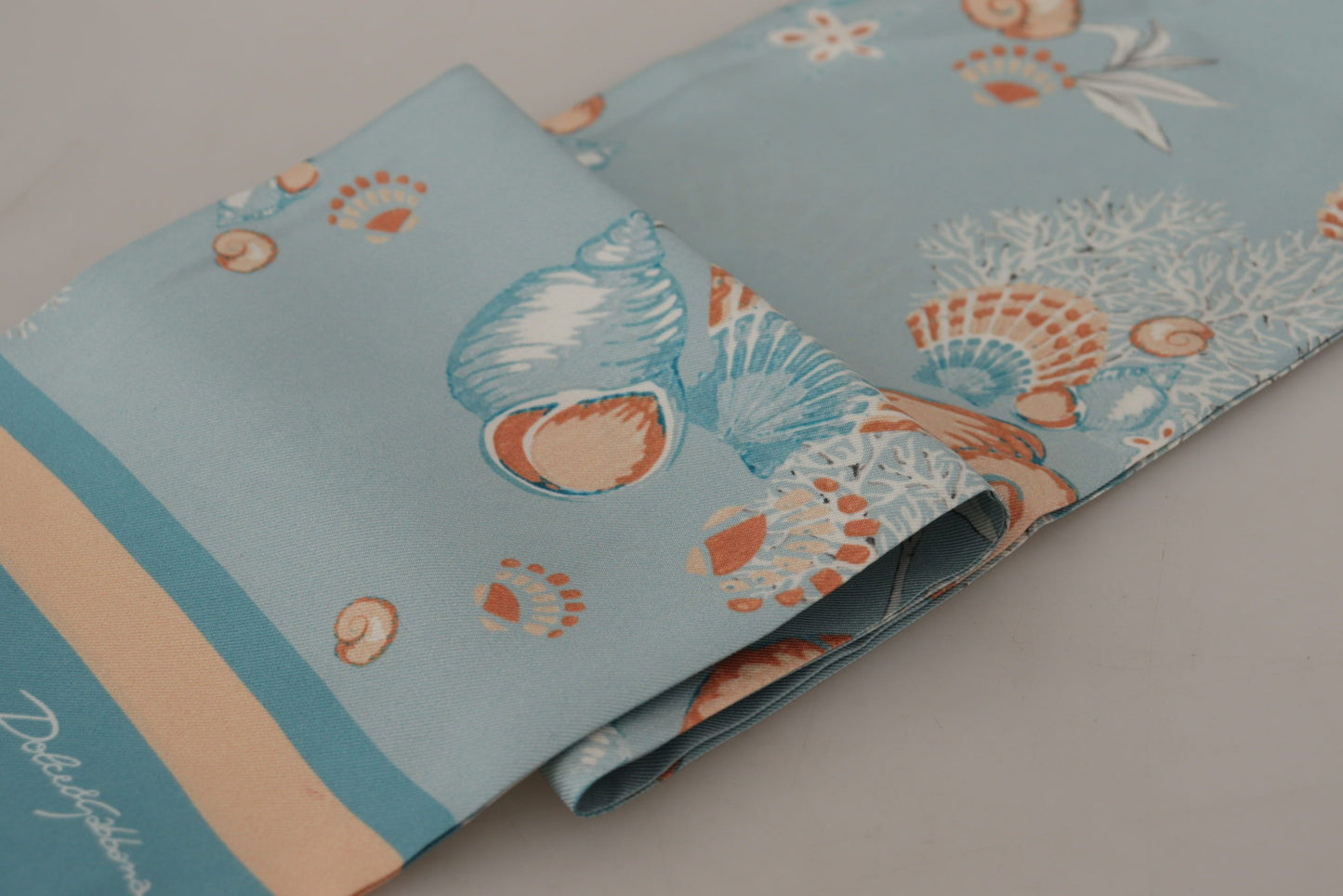 - Elegant Silk Scarf with Shell Motif