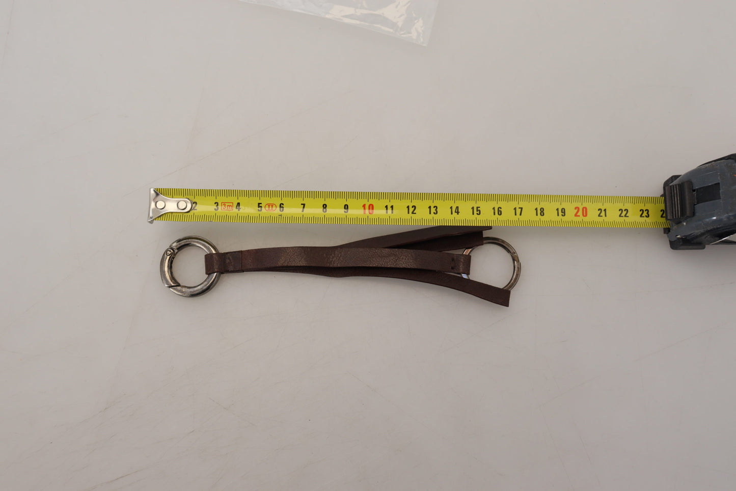 - Elegant Brass & Leather Keychain Charm