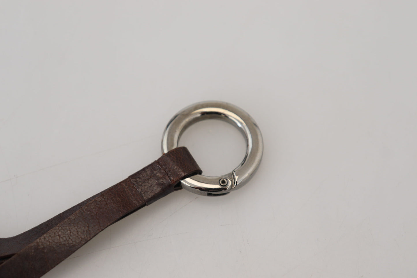 - Chic Brown Leather Keychain with Brass Accents