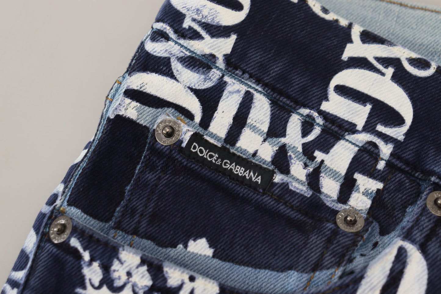 - Elegant Crown Print Denim Pants