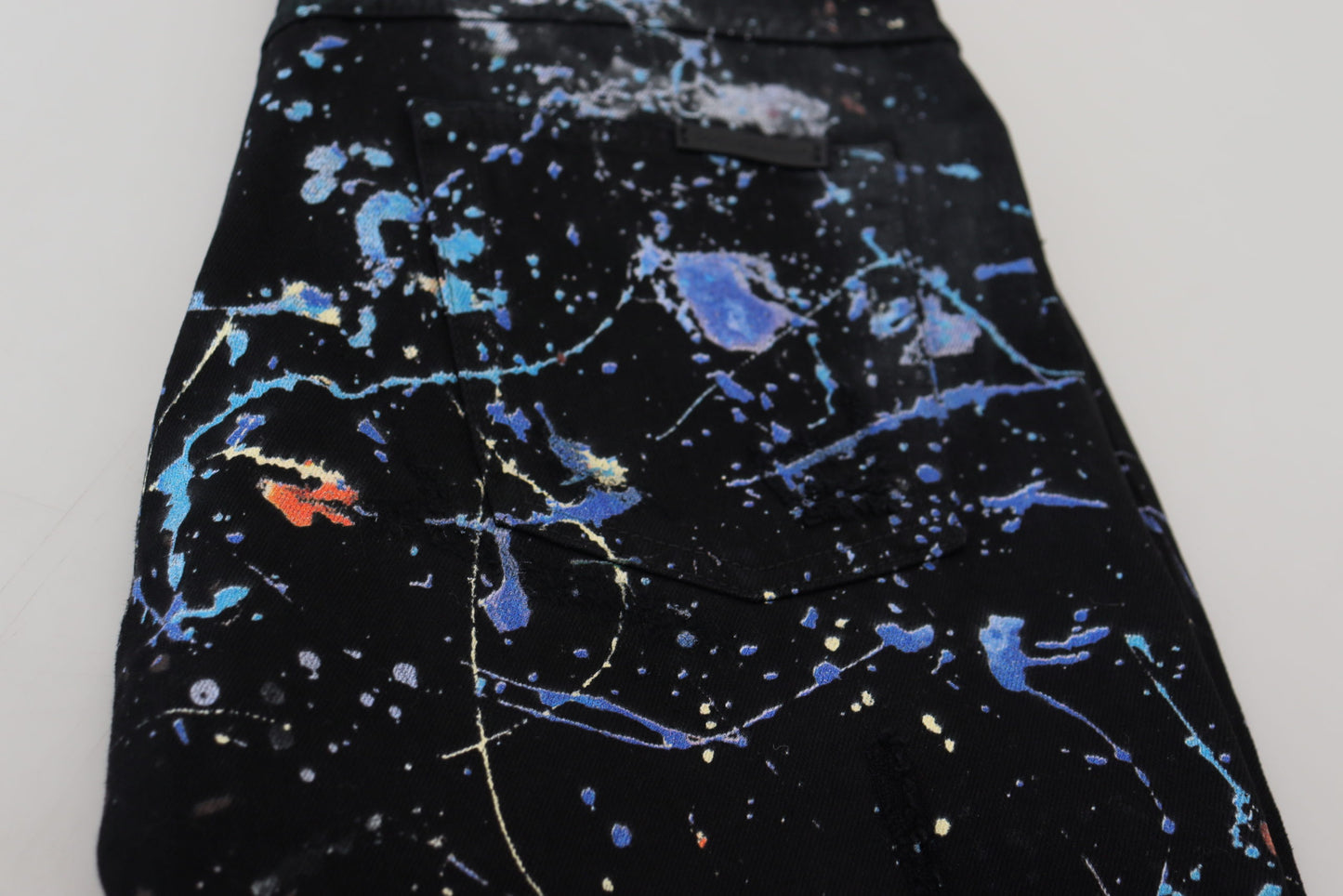 - Exquisite Color Splash Print Denim Pants