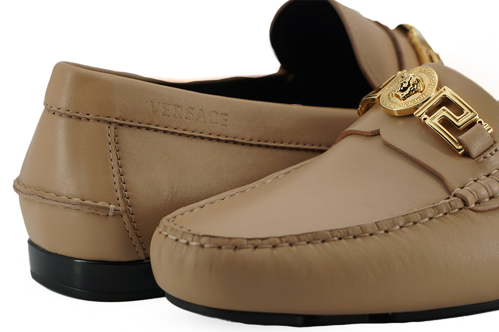 - Exquisite Medusa Gold-Tone Leather Loafers