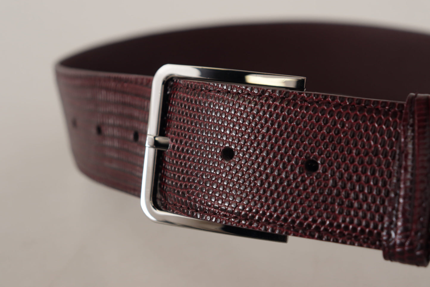 - Elegant Maroon Leather Belt with Engraved Buckle