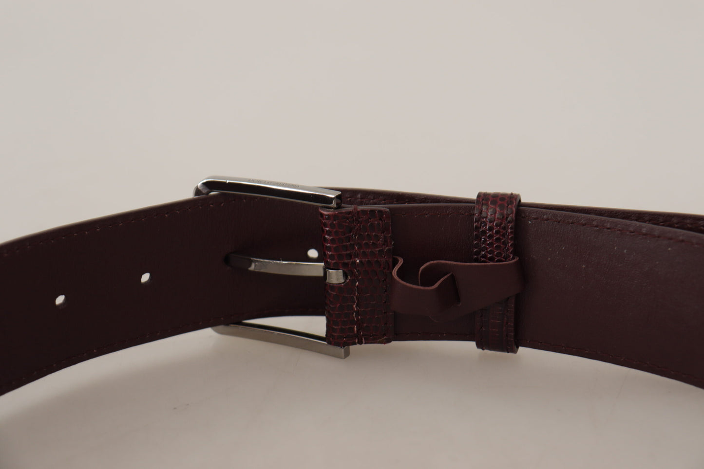 - Elegant Maroon Leather Belt with Engraved Buckle