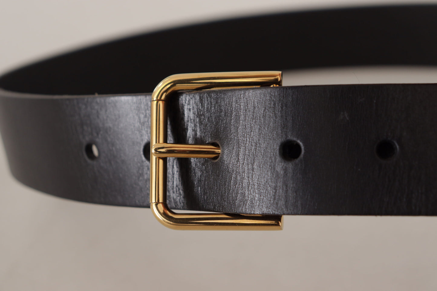- Elegant Black Leather Belt with Gold-Tone Buckle
