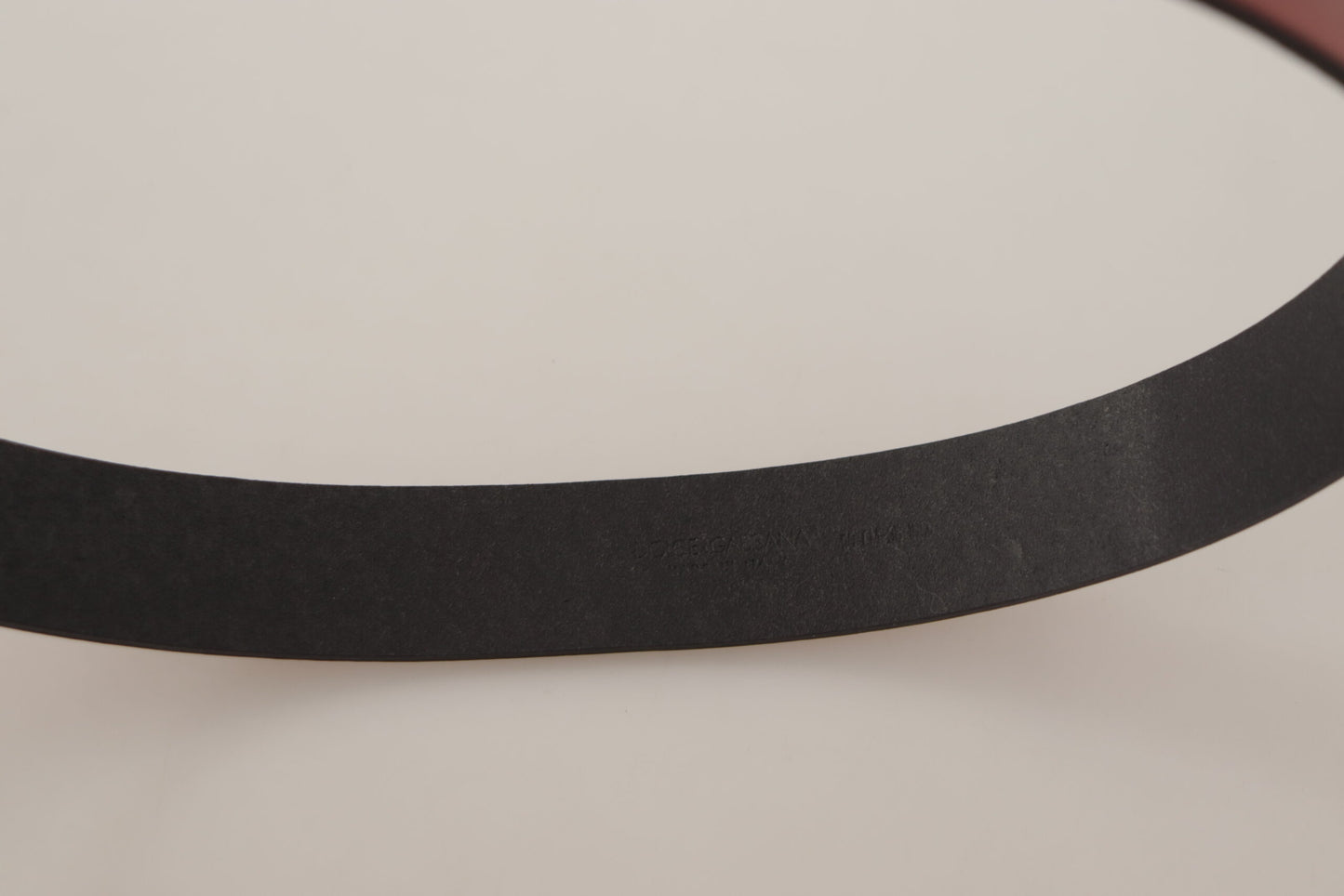 - Elegant Red Leather Belt with Engraved Buckle