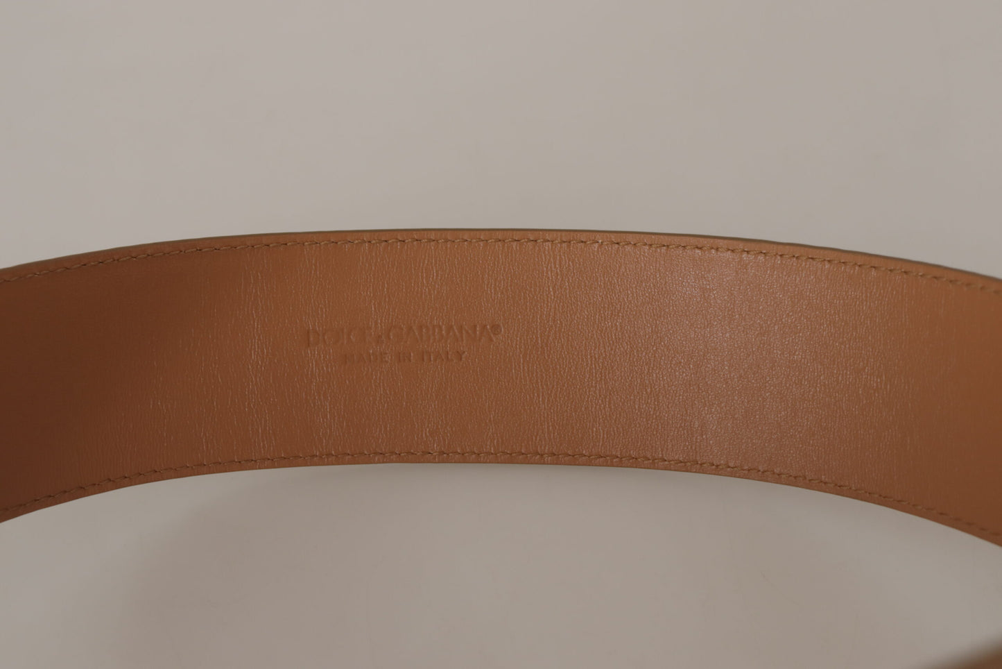 - Elegant Beige Leather Belt with Engraved Buckle