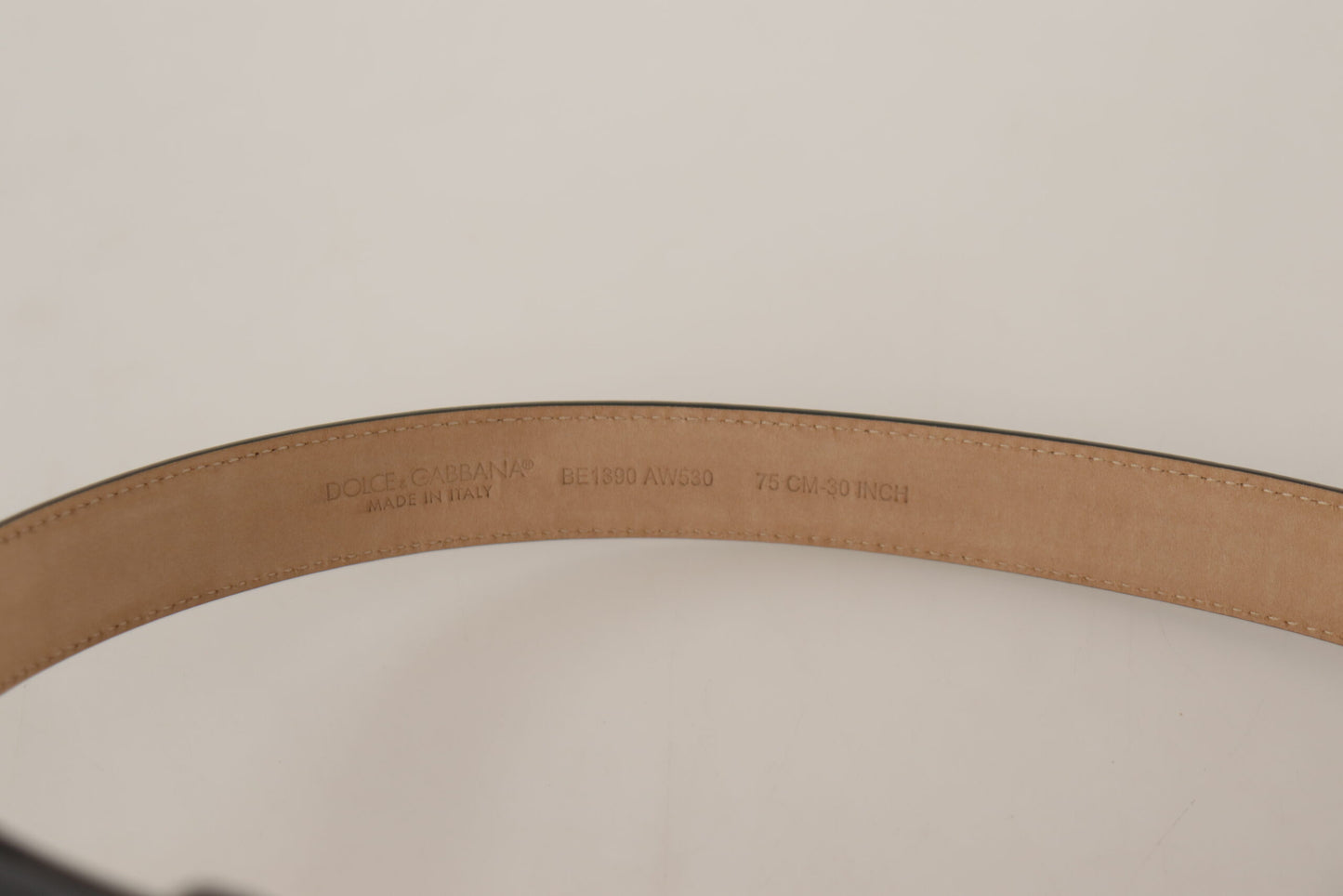 - Elegant Black Leather Belt with Engraved Buckle