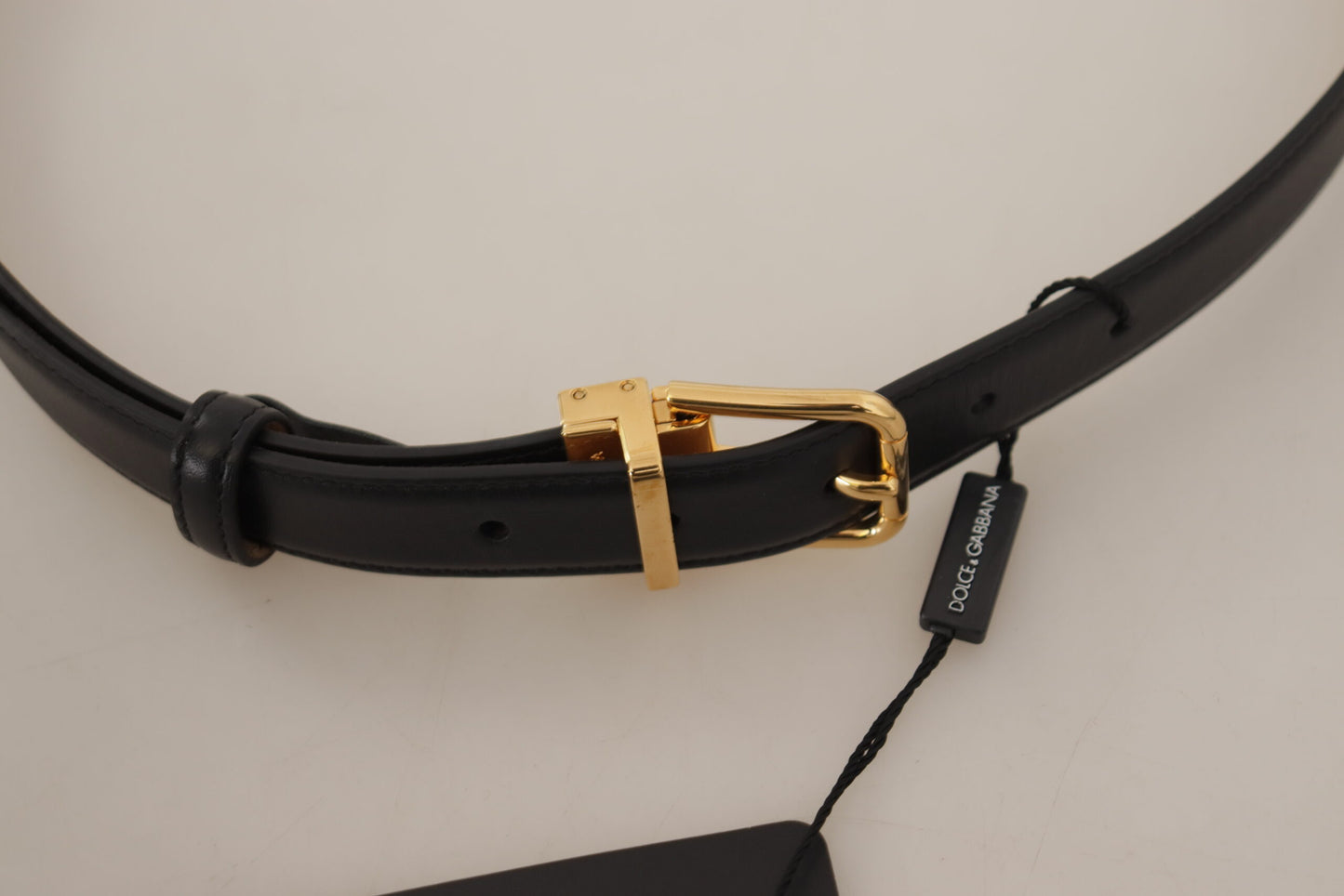 - Elegant Black Leather Belt with Engraved Buckle