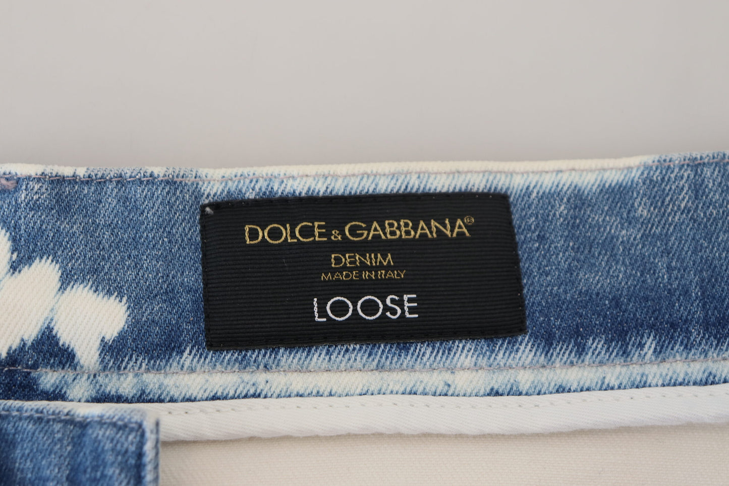 - Elegant Loose Fit Denim Pants with Unique Print
