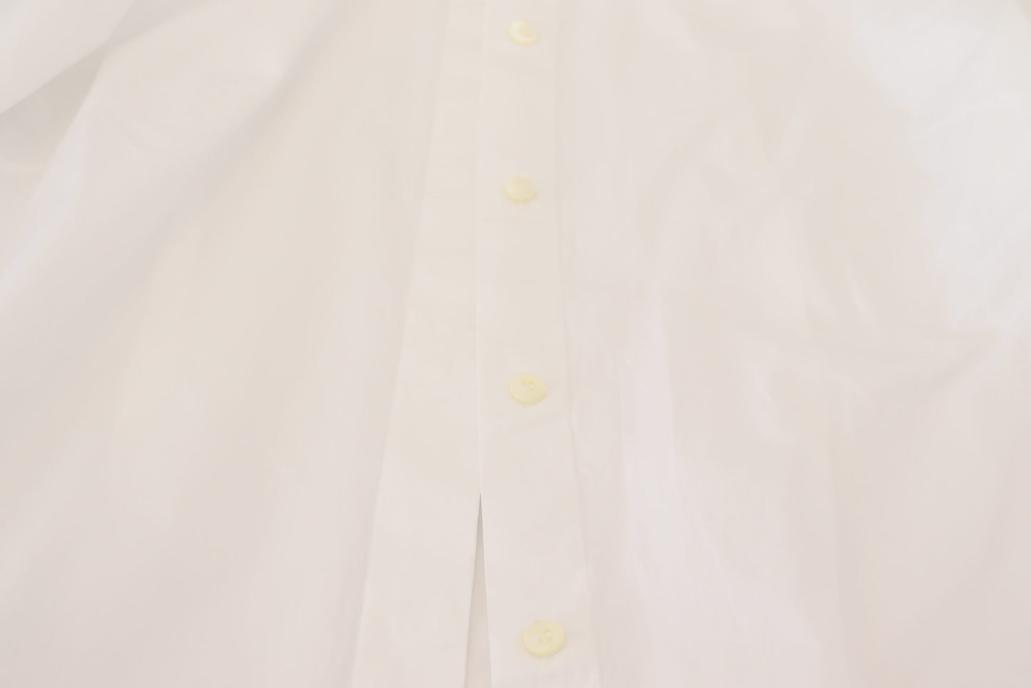 - Elegant White Cotton Button-Up Top