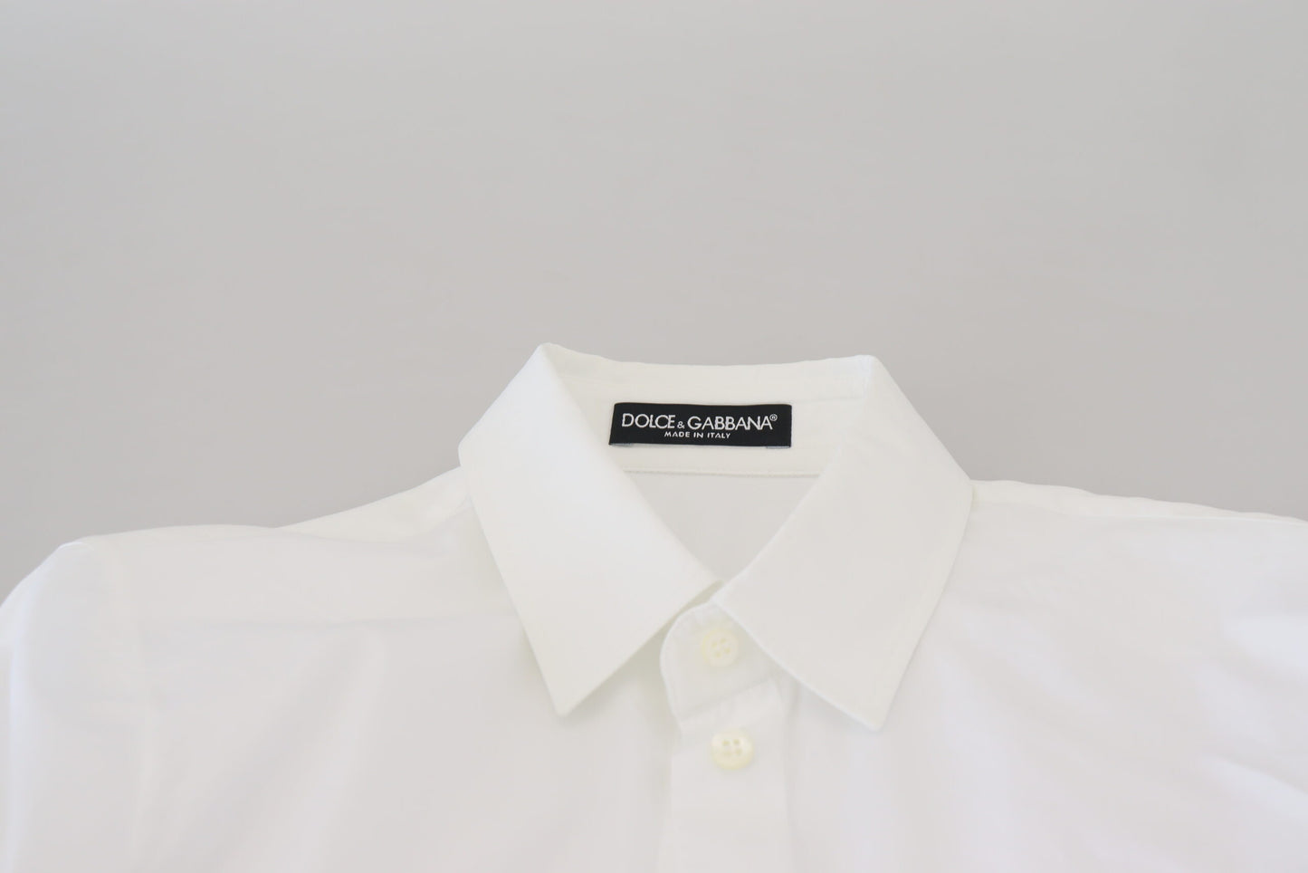 - Elegant White Cotton Button-Up Top