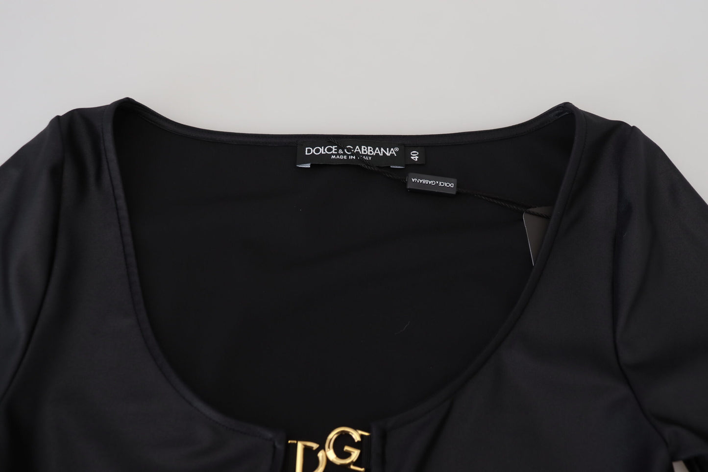 - Elegant Black 3/4 Sleeve Top with Gold Detailing