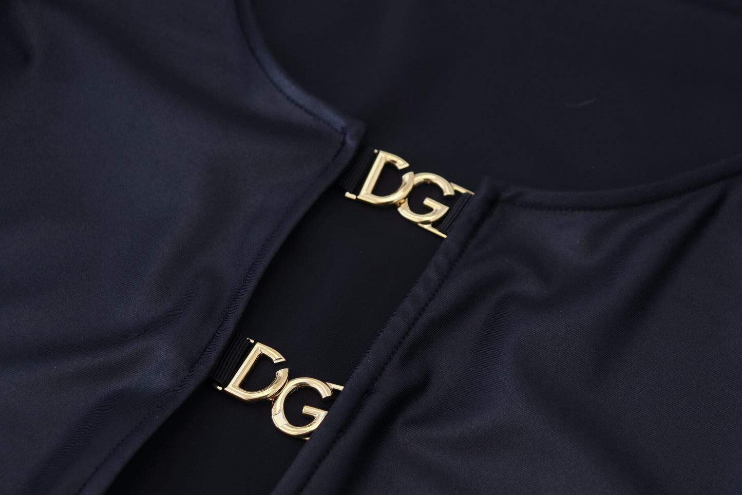 - Elegant Black 3/4 Sleeve Top with Gold Detailing