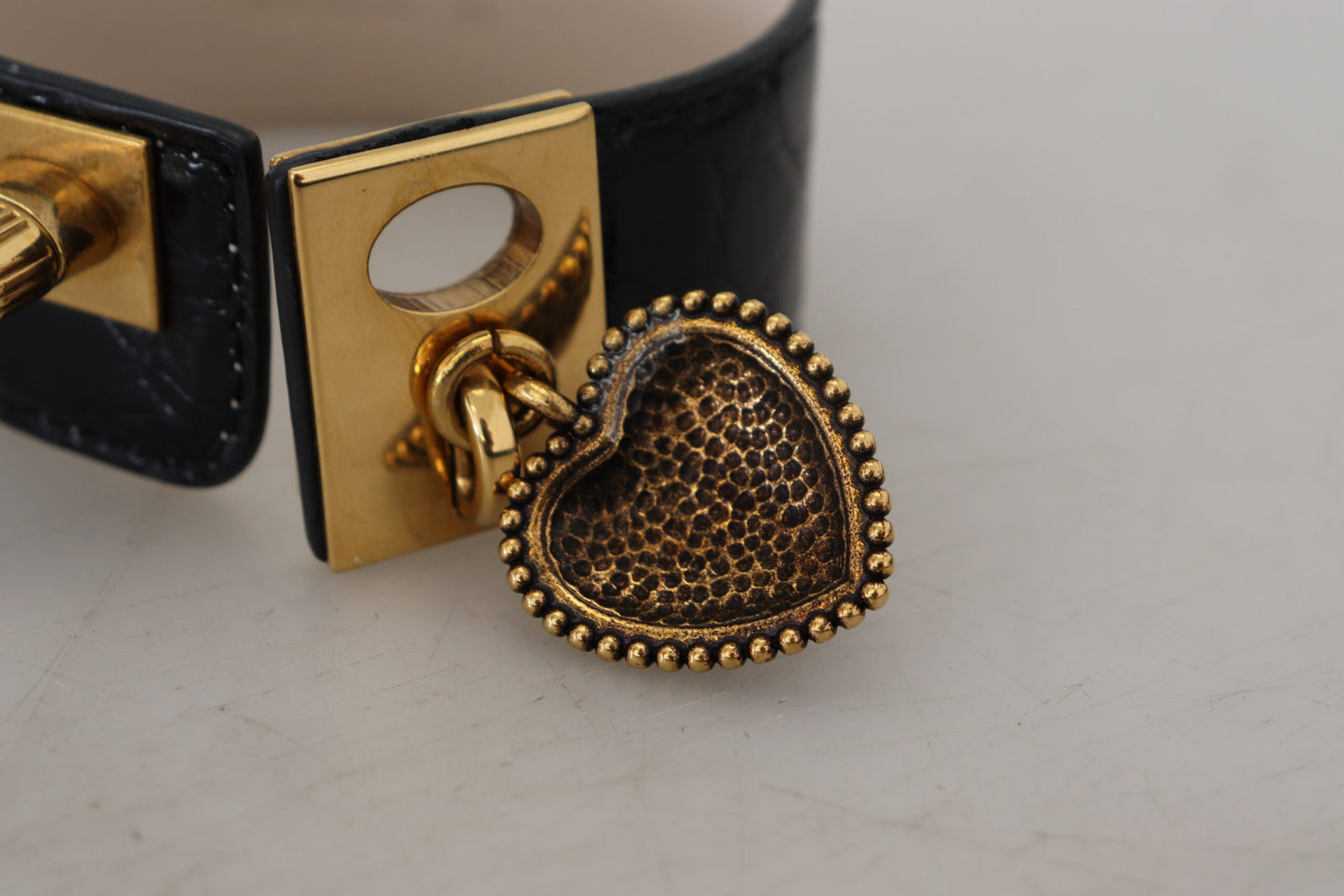- Elegant Black Leather Gold Detail Bracelet