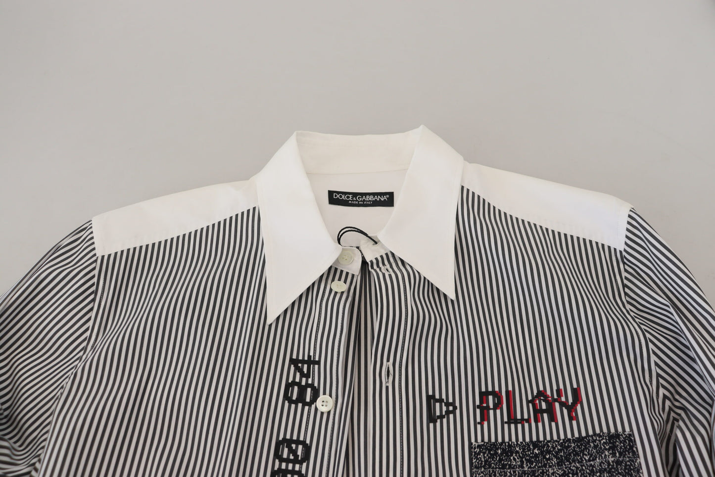 - Classic Black and White Striped Button-Down Shirt