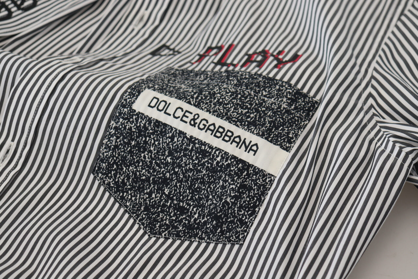 - Classic Black and White Striped Button-Down Shirt