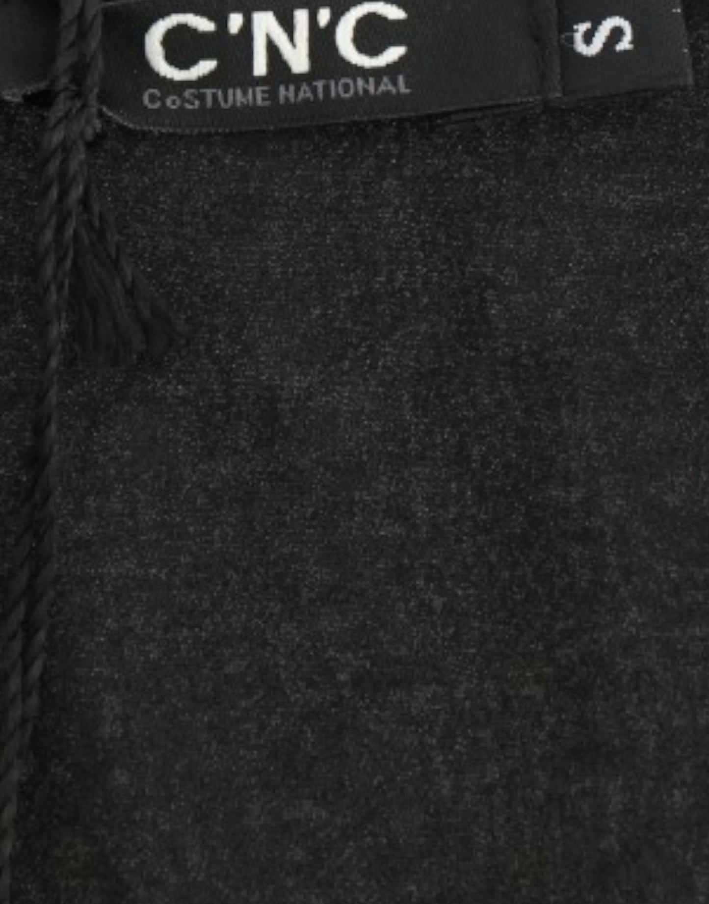 - Elegant Monochrome Sleeveless Top with Gold Accents