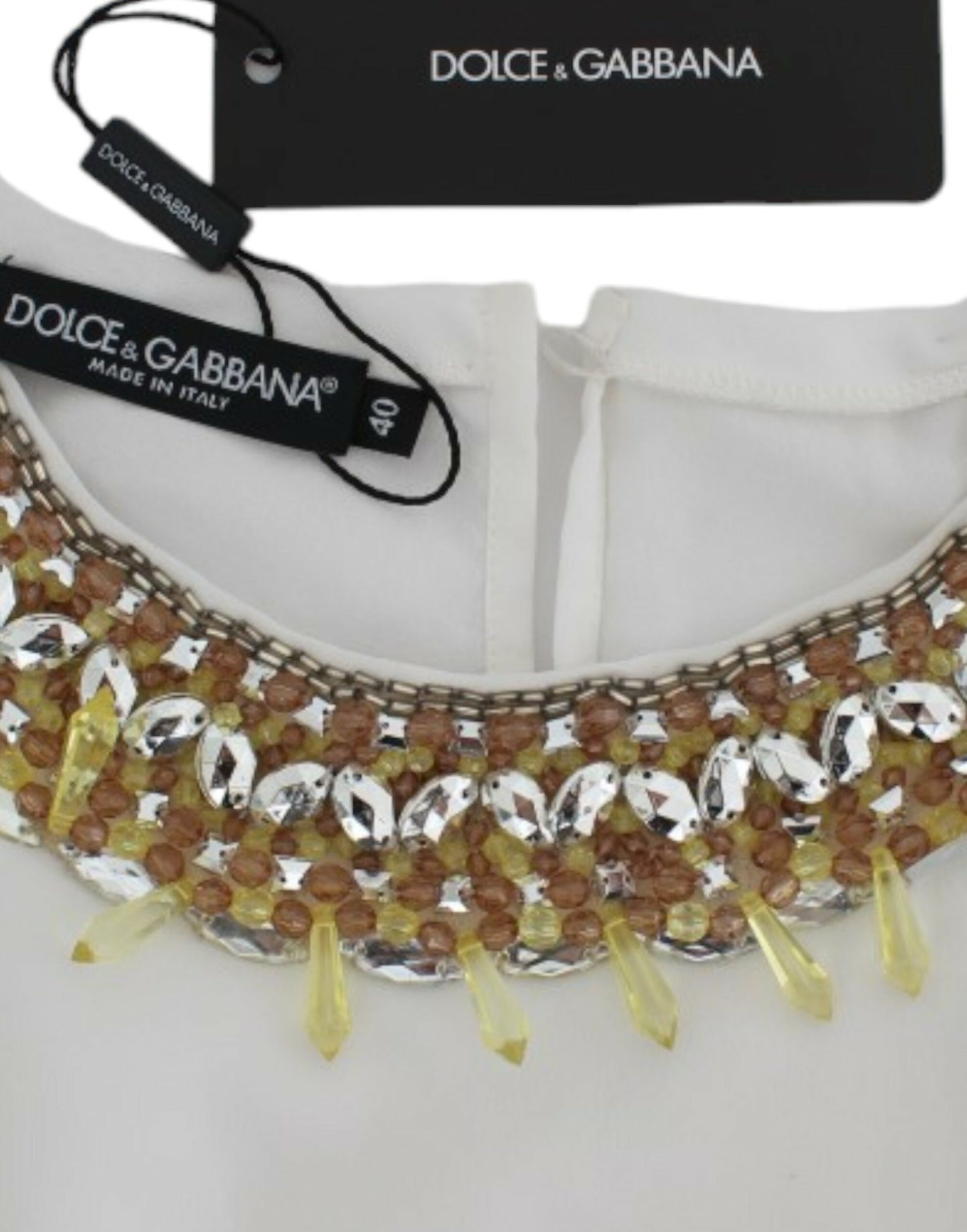 - Elegant Sleeveless Silk Blouse with Crystal Embellishment