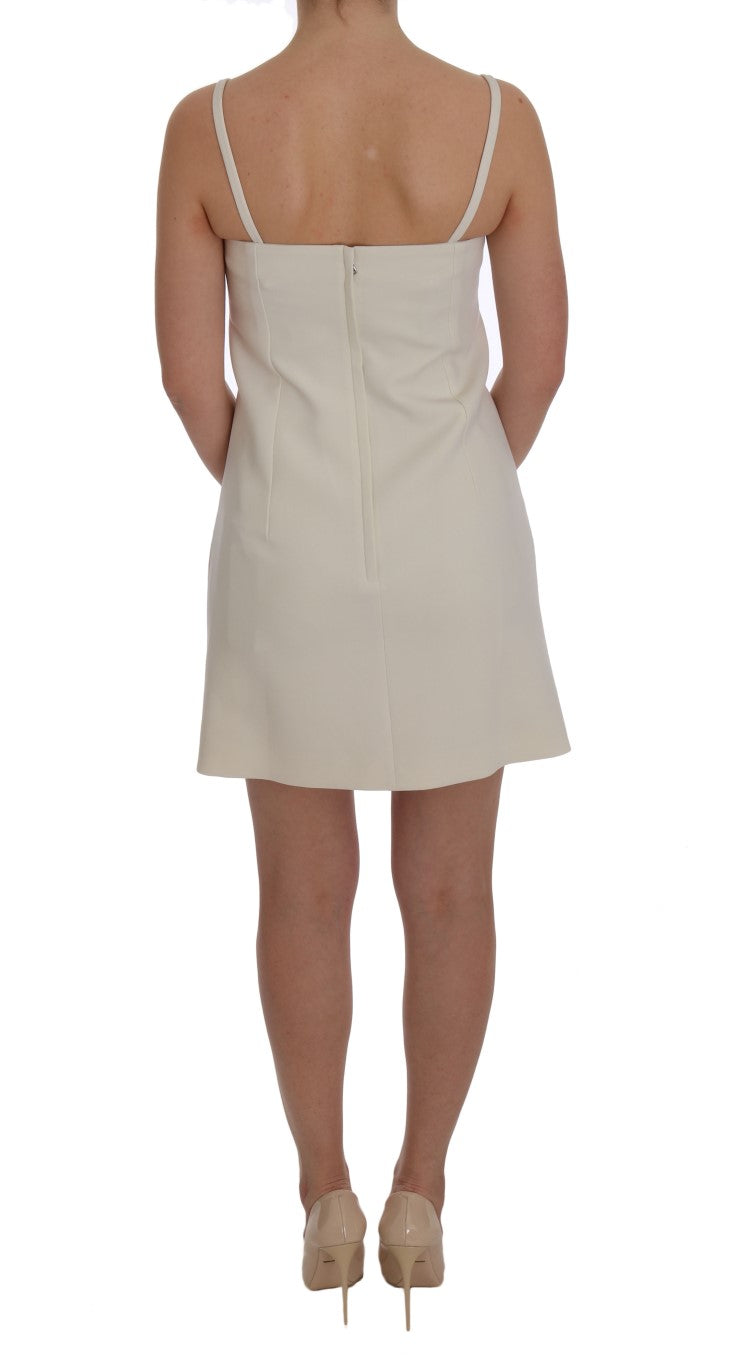- Elegant White Wool Shift Dress with Gold Brooch