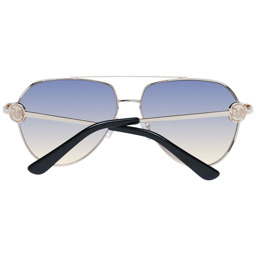Guess Women’s Sunglasses – Gold Aviator Frame with Blue Gradient Lenses, 62mm