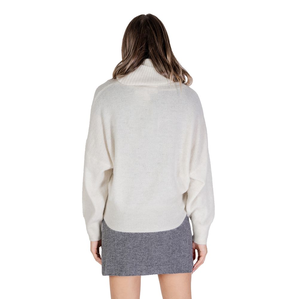 - Cream Acrylic Sweater