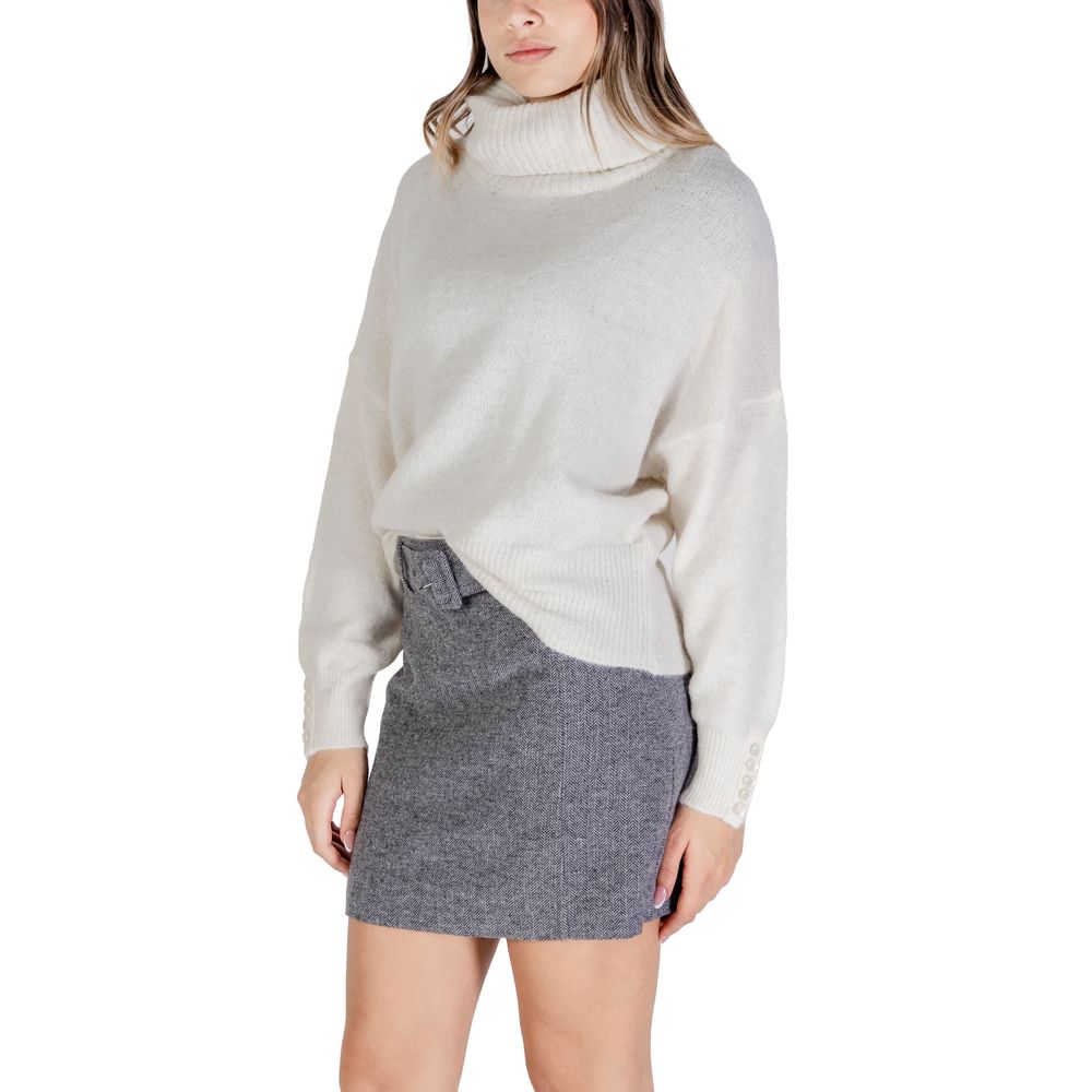 - Cream Acrylic Sweater