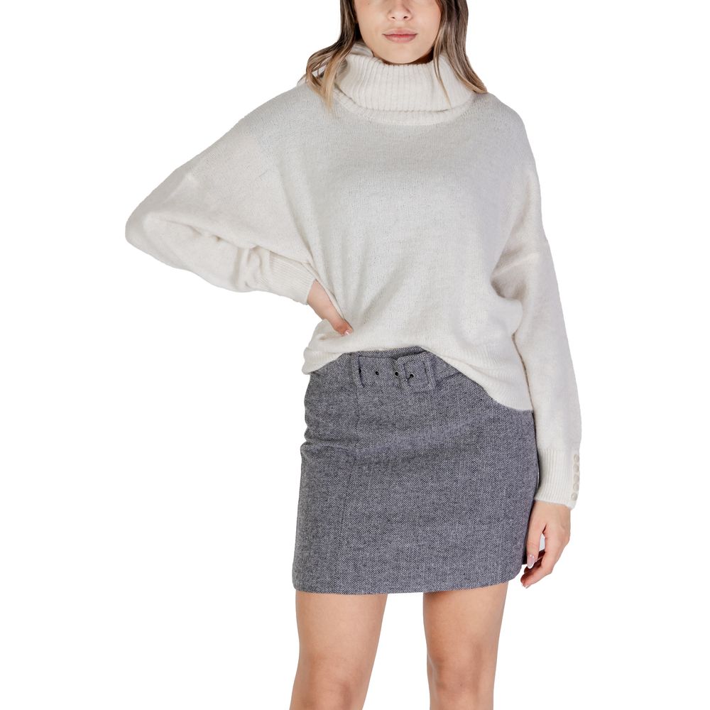 - Cream Acrylic Sweater