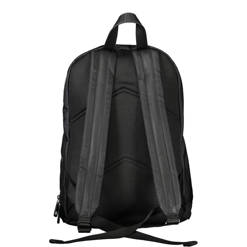 Calvin Klein Black Polyester Backpack: Modern Essential for Everyday Style