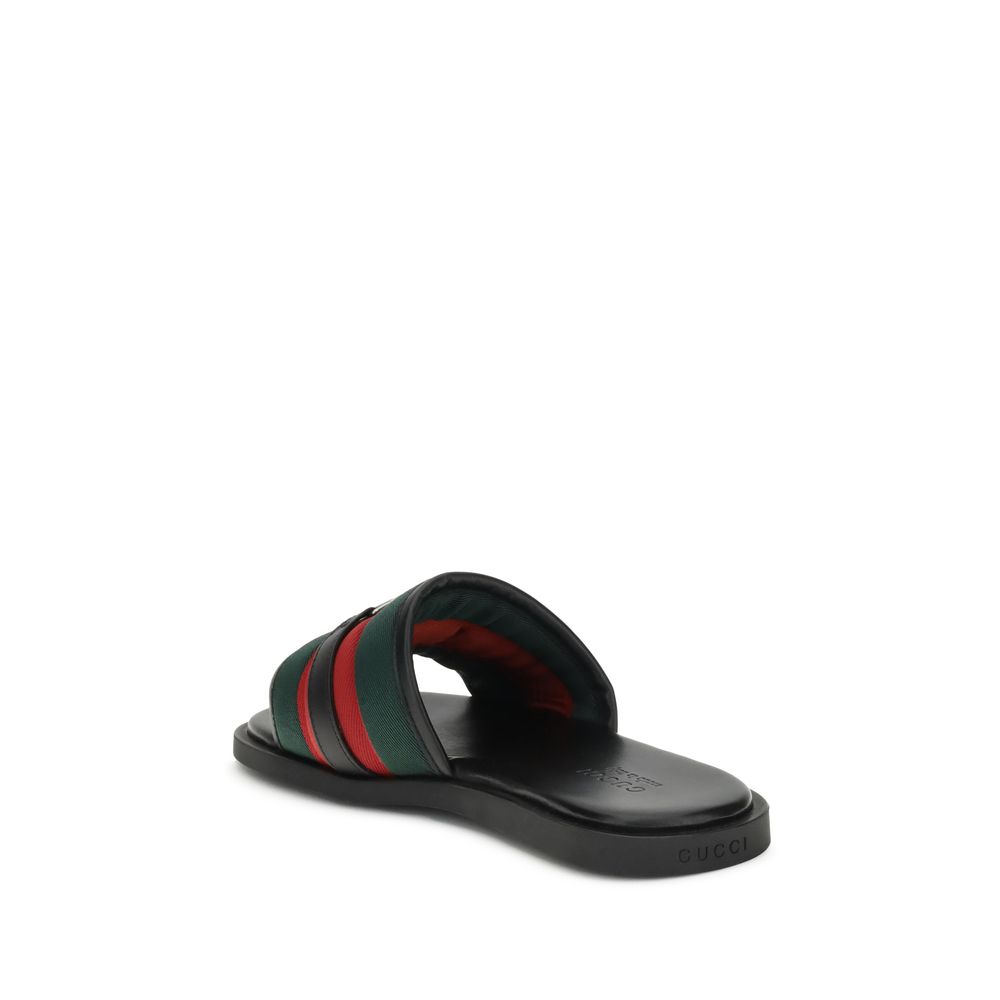 Gucci GG Motif Slider Sandals - Iconic Comfort Redefined