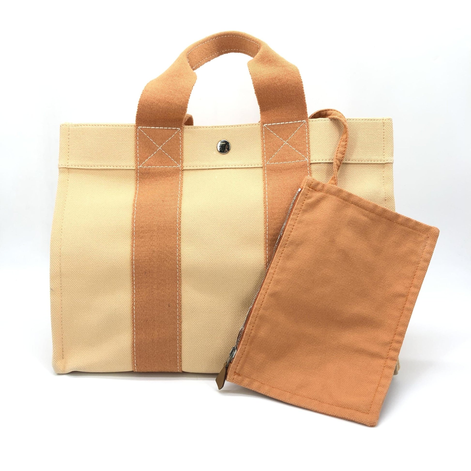Hermès Preloved Canvas Tote Bag in Exquisite Pastel Orange - Timeless Elegance and Functionality