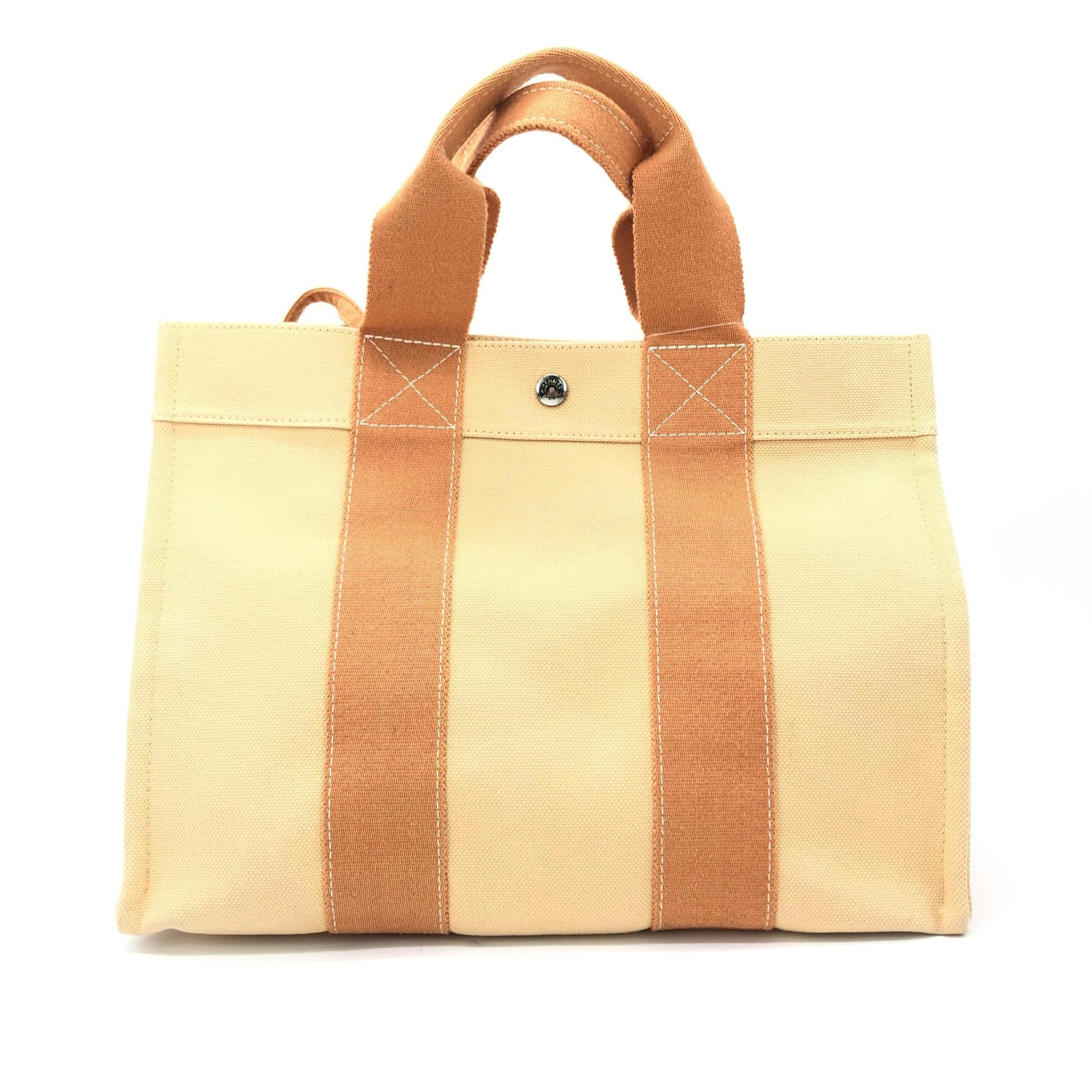 Hermès Preloved Canvas Tote Bag in Exquisite Pastel Orange - Timeless Elegance and Functionality