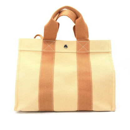 Hermès Preloved Canvas Tote Bag in Exquisite Pastel Orange - Timeless Elegance and Functionality