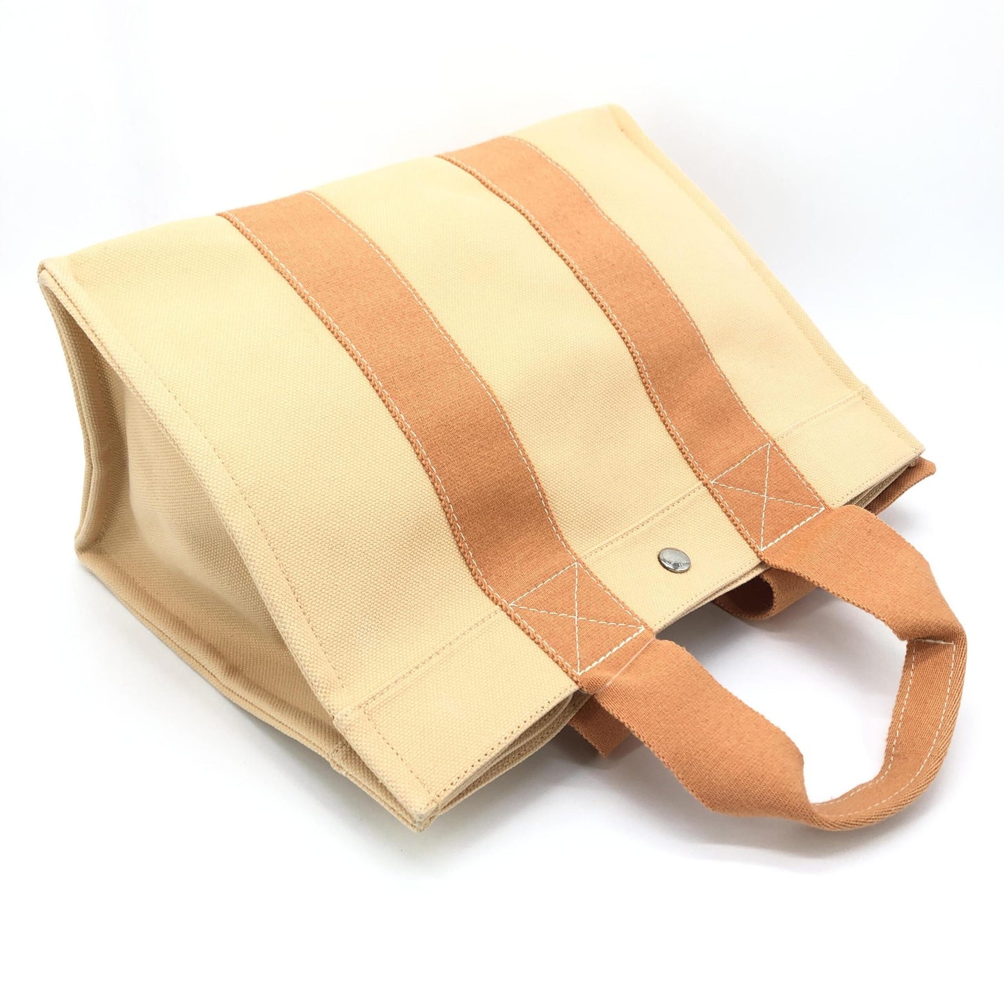 Hermès Preloved Canvas Tote Bag in Exquisite Pastel Orange - Timeless Elegance and Functionality
