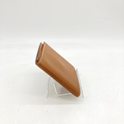 Hermès Preloved Compact Wallet in Brown Leather – Timeless Elegance with Character