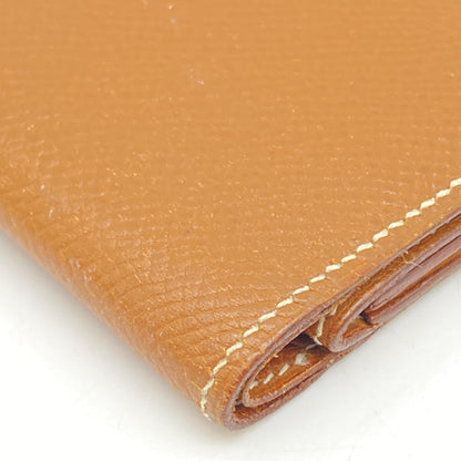 Hermès Preloved Compact Wallet in Brown Leather – Timeless Elegance with Character