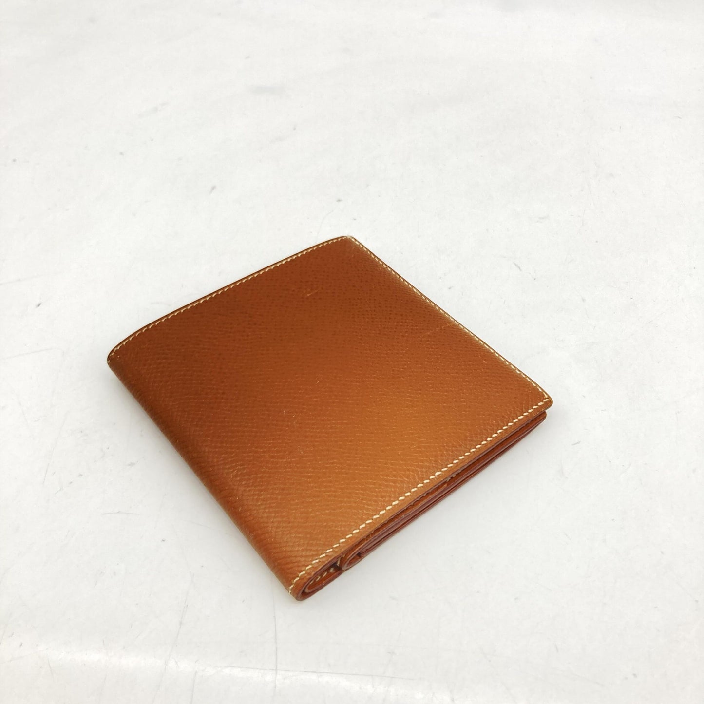 Hermès Preloved Compact Wallet in Brown Leather – Timeless Elegance with Character