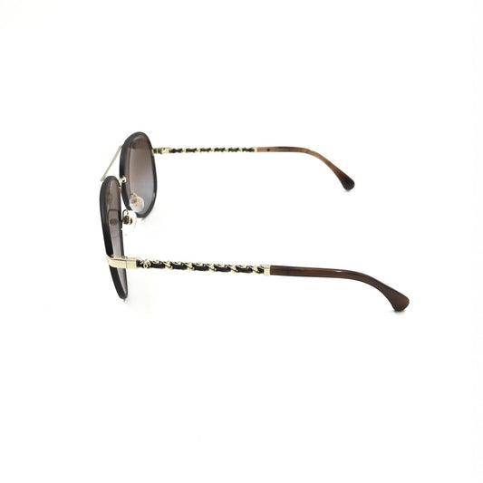 Chanel Preloved Gold and Black Polarized Aviator Sunglasses: A Timeless Accessory for the Discerning Fashionista