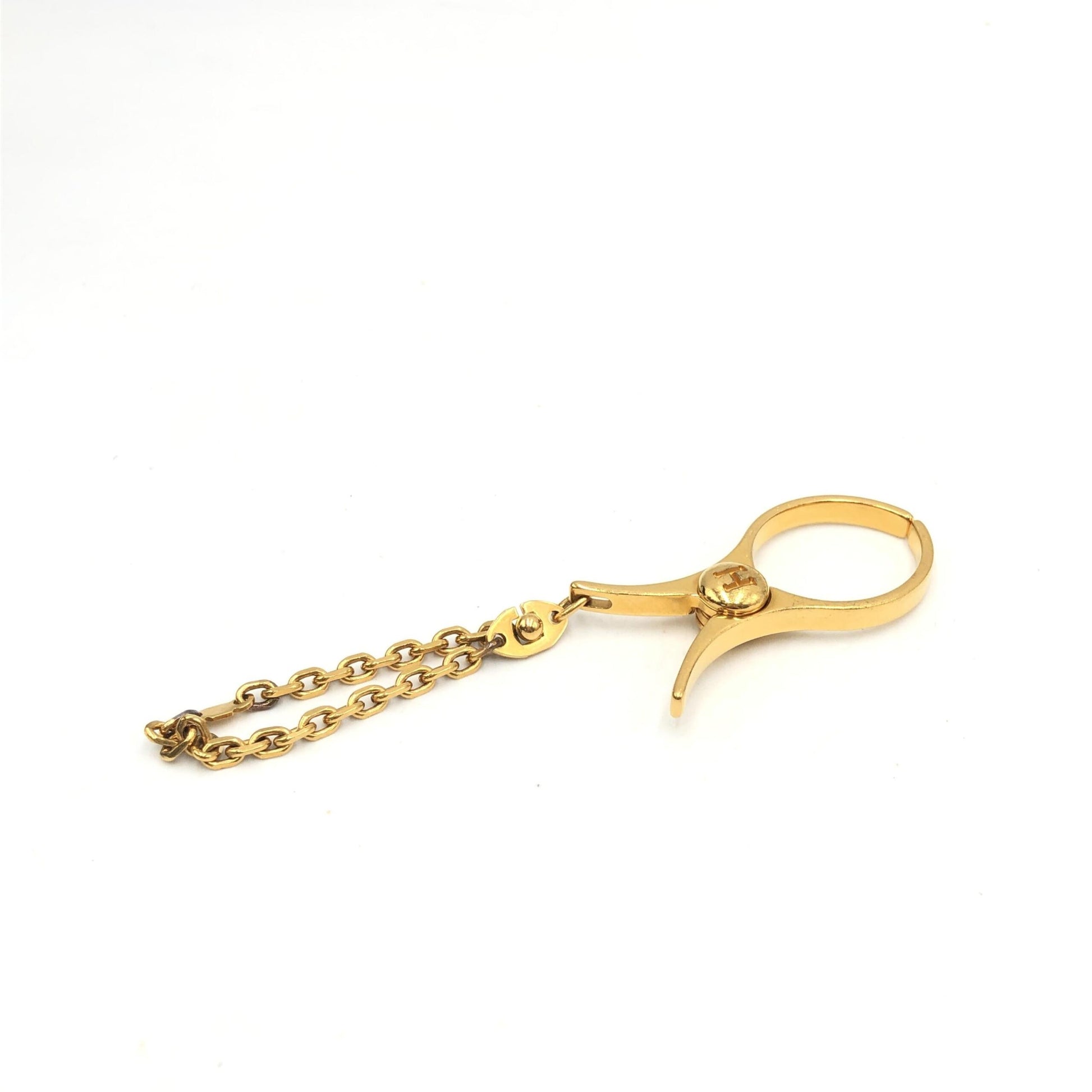 Hermès Preloved Gold Metal Glove Holder Keychain – A Timeless Luxury Accessory