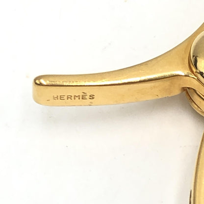 Hermès Preloved Gold Metal Glove Holder Keychain – A Timeless Luxury Accessory