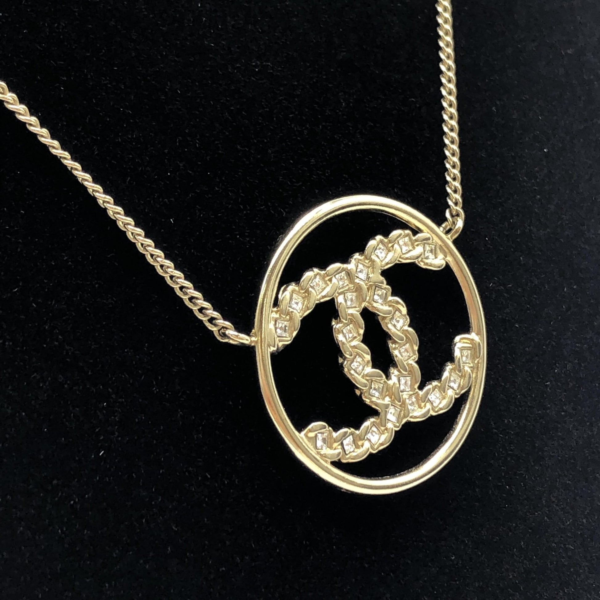Chanel Preloved Gold Tone CC Circle Pendant Necklace with Rhinestones
