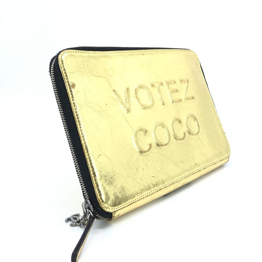 Chanel Preloved Gold Tone Votez Coco Zip Clutch – A Timeless Elegance in Excellent Condition