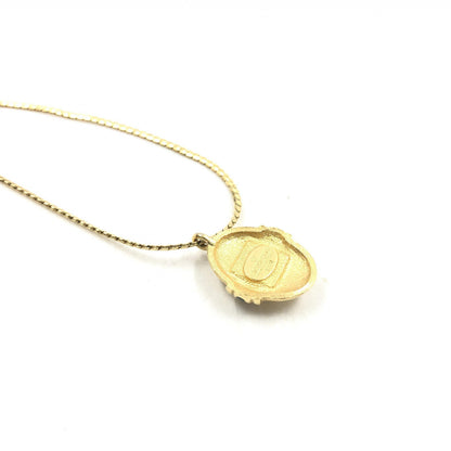 Givenchy Preloved Pendant Necklace - A Timeless Elegance in Gold Finish with Minor Character Marks