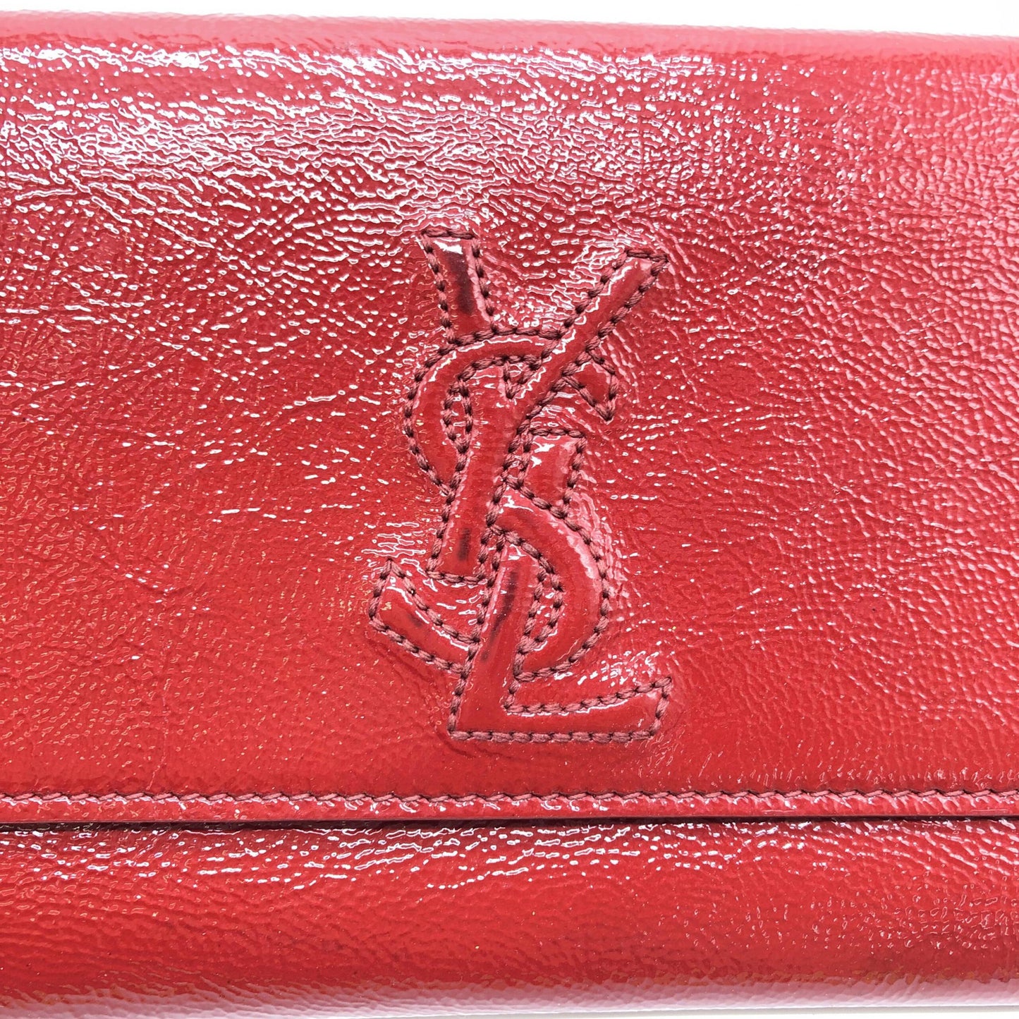 Yves Saint Laurent Preloved Red Patent Leather Clutch Bag – A Timeless Luxury Statement