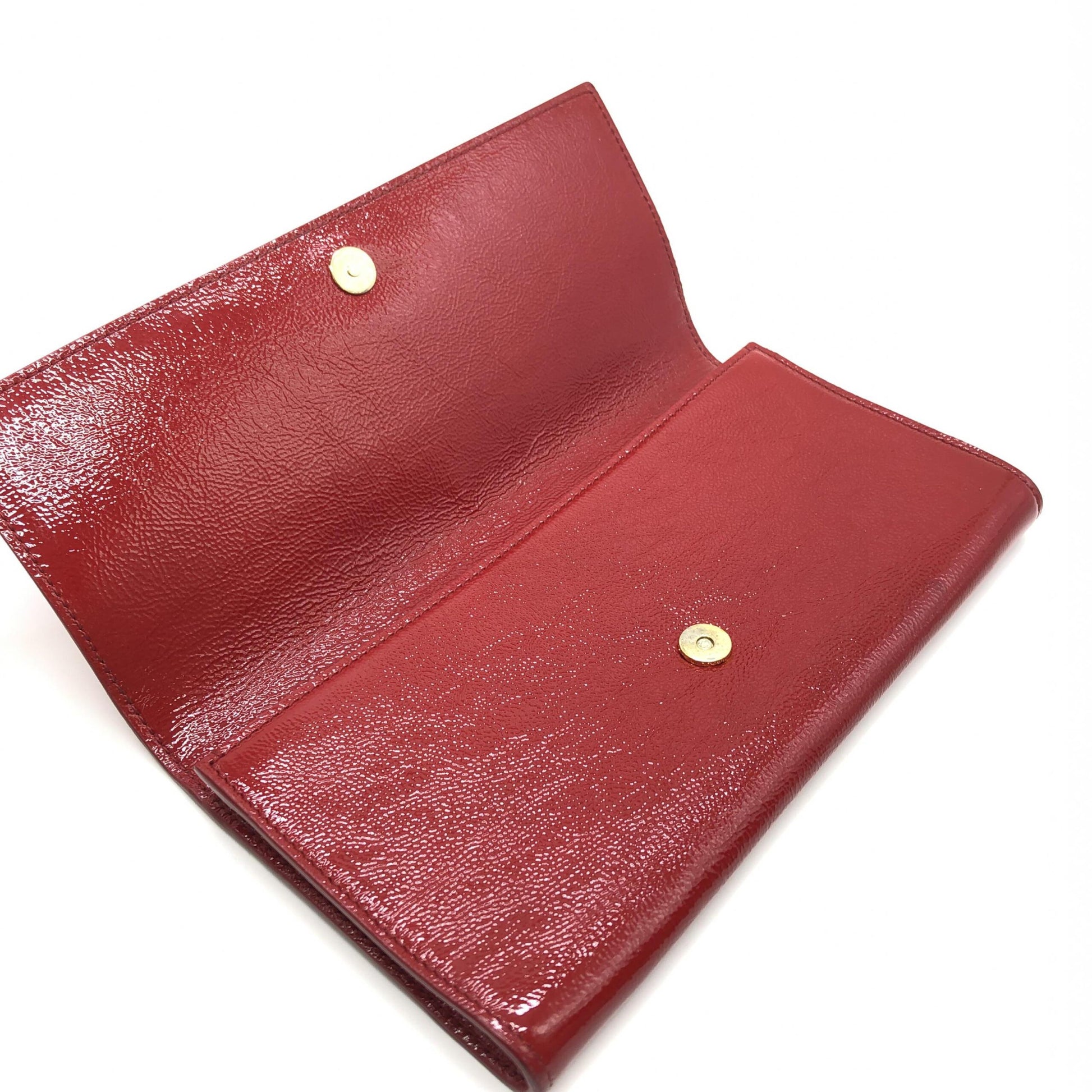 Yves Saint Laurent Preloved Red Patent Leather Clutch Bag – A Timeless Luxury Statement