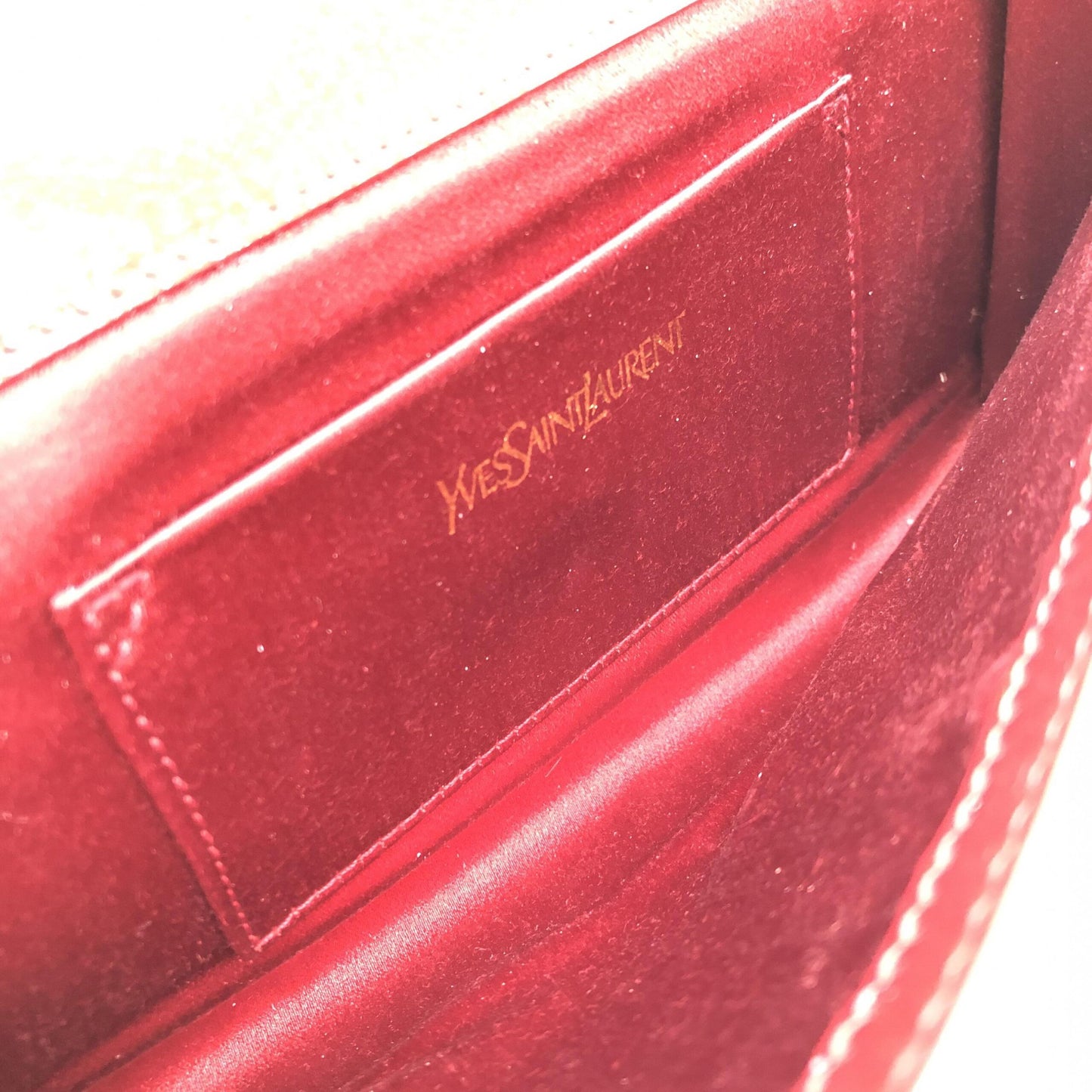 Yves Saint Laurent Preloved Red Patent Leather Clutch Bag – A Timeless Luxury Statement