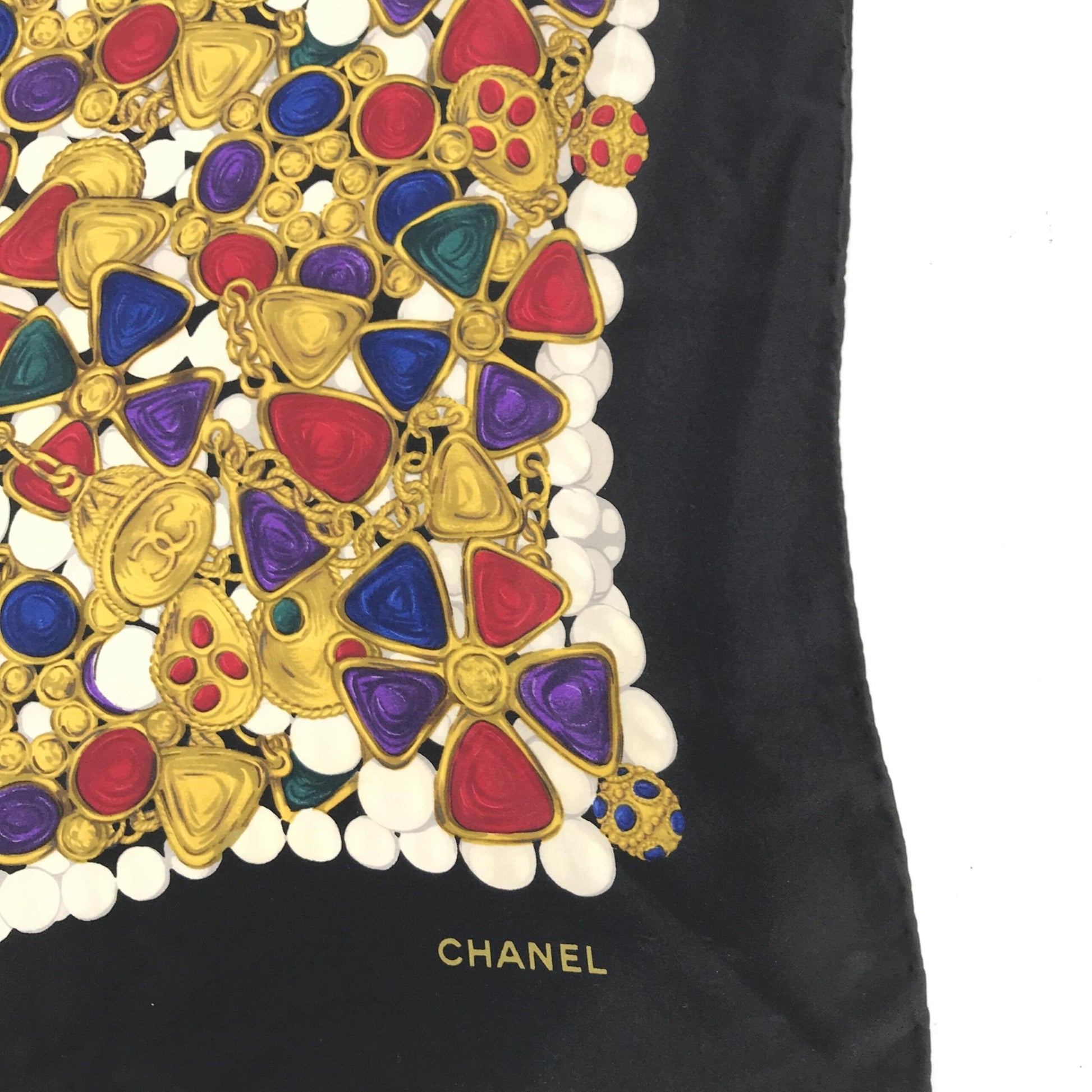 Chanel Preloved Silk Scarf with Vibrant Jewelry Print – A Luxurious Expression of Timeless Elegance