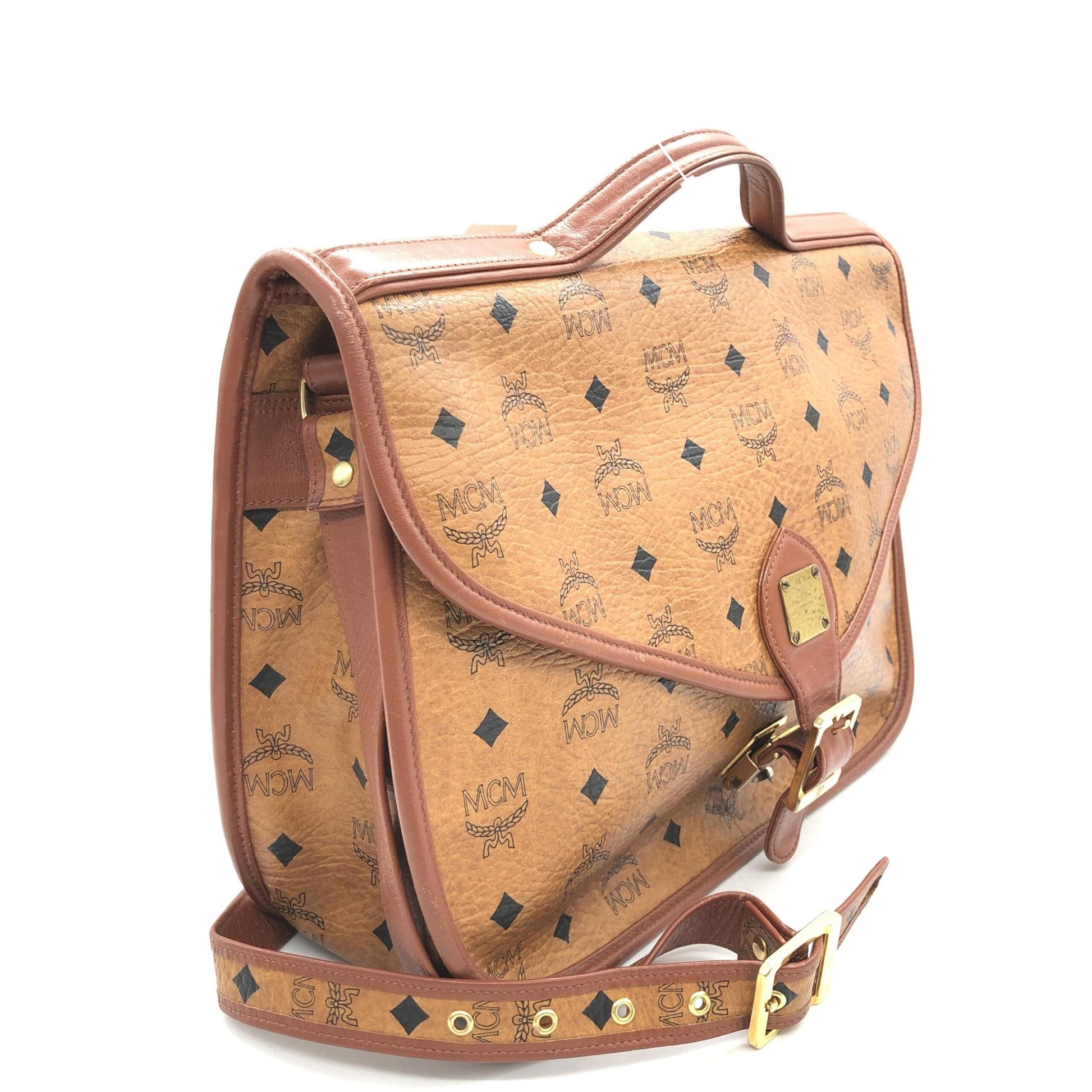 MCM Preloved Vesutos Leather Messenger Bag - Exquisite Craftsmanship in Cognac with Vintage Charm